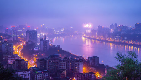 New Year's city night view with fireworks and a sky filled with colorful lights, overlooking the river in Chongqing. The distant skyline is illuminated by dazzling lights, creating an enchanting atmosphere. Fireworks dance above the urban landscape, adding joy to the New Year celebrations. High-resolution photography and professional color grading enhance the visual appeal. --ar 53:30 --v 6.1 Job ID: 36d4ef88-c62d-463d-8bd7-565eb761680dの素材