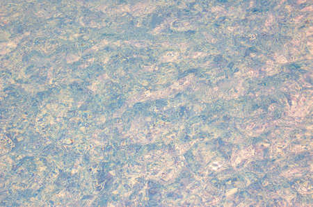 Background of blue and pink pool waterの写真素材