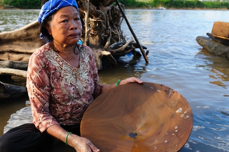 The older Dayak women - gold-prospector  from Borneo. East Kalimantan, Indonesia, のeditorial素材