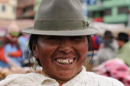Ecuador, Pujili - September 11  Ecuadorian ethnic women in national clothes selling agricultural products and other food items on a market in the Pujili village on September 11, 2012 in Pujiliのeditorial素材