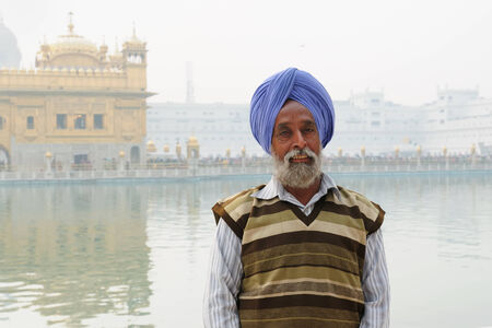 INDIA, AMRITSAR - DECEMBER 01  Pilgrim aiming at the Golden temple  Sri Harimandir Sahib , Amritsar in December 01, 2009のeditorial素材