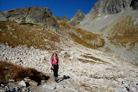 Female trekking at one of the highest and most visited mountain in the High Tatras of Slovakiaのeditorial素材