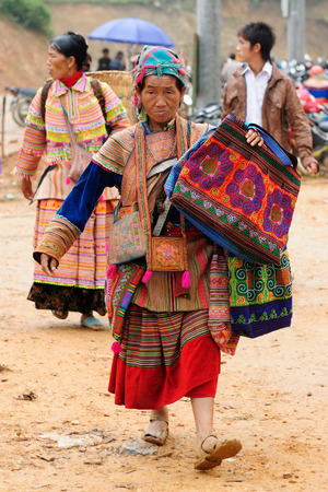 Sapa, Vietnam - October 22:  Woman in the traditional dress of Homong people settling on the  mountain regions of the Sapa town  on  October 22, 2010のeditorial素材