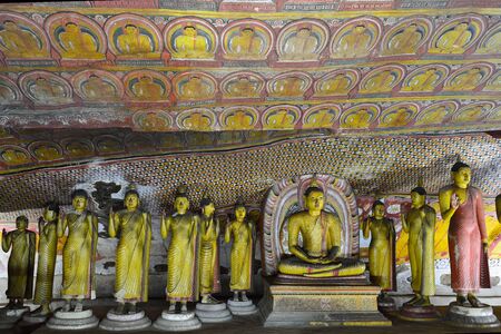 Insides of caves in ancient Buddhist complex in Dambulla cave temple. Sri Lanka. The photograph is presenting the statue of lying Buddhaのeditorial素材