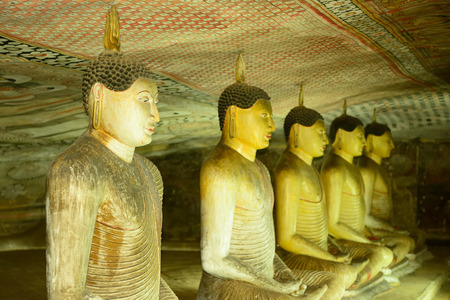 Insides of caves in ancient Buddhist complex in Dambulla cave temple. Sri Lanka. The photograph is presenting the statues of Buddhaのeditorial素材