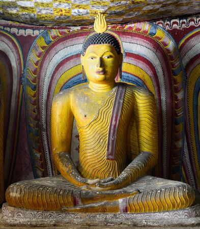 Insides of caves in ancient Buddhist complex in Dambulla cave temple. Sri Lanka. The photograph is presenting the statue of sitting Buddhaのeditorial素材