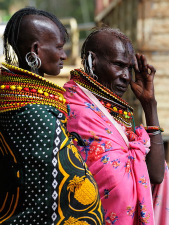 MARARAL, KENYA - JULY 04: African woman from the Turkana tribe on the market in the Mararal town in Kenya, Mararal in July 04, 2013のeditorial素材