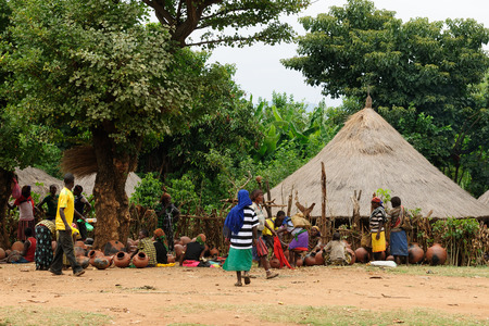 JINKA, ETHIOPIA - JULY 25: Local Ethiopian people being a market trader in the Jinka town in the Omo valley in Ethiopia, Jinka in July 25, 2013のeditorial素材
