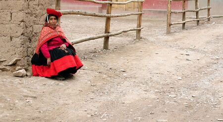 CUSCO, PERU - APRIL 05: Portrait of the woman from the Sacred Valley in the Cusco area waiting in the street for the transport to the market in South America in April 05, 2012のeditorial素材