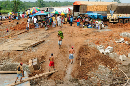 PERU, AMAZONIA - JUNE 02: Loading of the ship in a river port on the bank of the Amazon river in June 02, 2012のeditorial素材