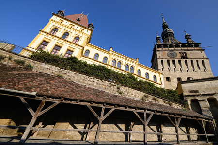 Fragment of the old town in Sighisoara in Romania. Clock towerのeditorial素材