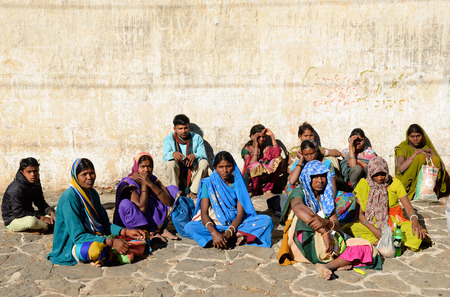 JUNAGADH, GUJARAT, INDIA - JANUARY 18: Group of Indian pilgrims resting in transit to the Temple complex on the holy Girnar top in Gujarat state in India,Junagadh in January 18, 2015のeditorial素材