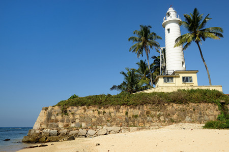 Colonial fine condition building development of the fort Galle on Sri Lanka. The photograph is presenting Galle Lighthouse on walls of the fort, Sri Lankaのeditorial素材