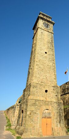 Colonial fine condition building development of the fort Galle on Sri Lanka. The photograph is presenting Galle fort clock towers on walls of the fort, Sri Lankaのeditorial素材