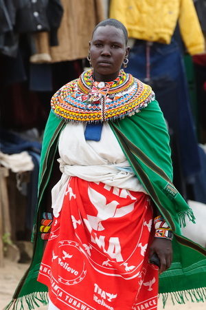 MARARAL, KENYA - JULY 03: African woman from the Samburu tribe with characteristic decorative necklaces on the market in the Mararal town in Kenya, Mararal in July 03, 2013のeditorial素材