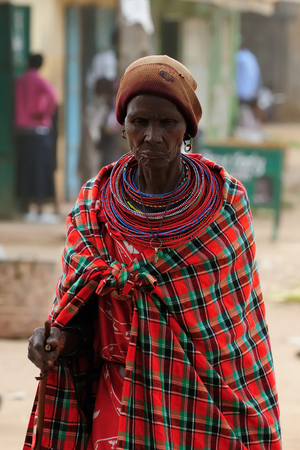 MARARAL, KENYA - JULY 03: African woman from the Samburu tribe with characteristic decorative necklaces on the market in the Mararal town in Kenya, Mararal in July 03, 2013のeditorial素材