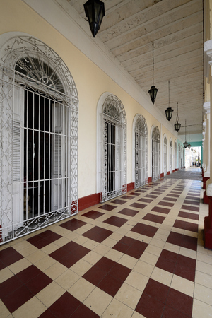 CIENFUEGOS, CUBA - 05 NOVEMBER 2016: Colonial building development by the main promenade on the old town in Cienfuegos on Cubaのeditorial素材