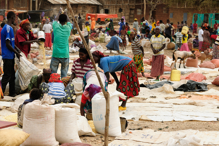 KONSO, ETHIOPIA - 22 JULY 2013: Local Ethiopian people being a market trader in the Konso town in the Omo valley in Ethiopiaのeditorial素材