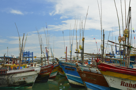 TANGALLE, SRI LANKA - 26 FEBRUARY 2015: Fishing cutters in the fishing harbour in Tangalleのeditorial素材