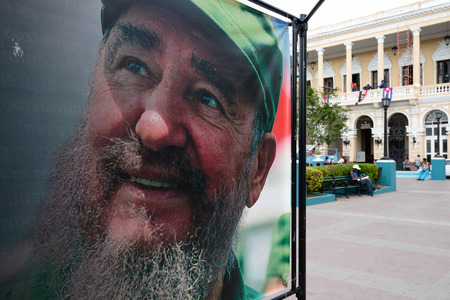 SANTAGO DE CUBA, CUBA  - 01 DECEMBER 2016: Exhibition of photographs from the life of Fidel organised after his death, on the main square Santiago, presenting moments from the life of the dictatorのeditorial素材