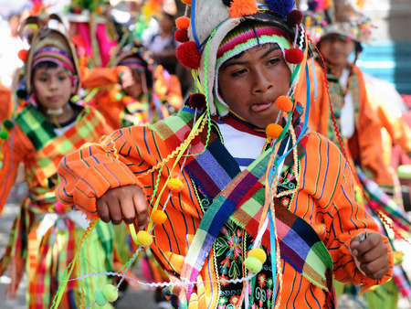 SUCRE, BOLIVIA - 10 SEPTEMBER 2011: Fiesta de la Virgen de Guadalupe in Sucre. Young participants in the dance parade in Sucreのeditorial素材