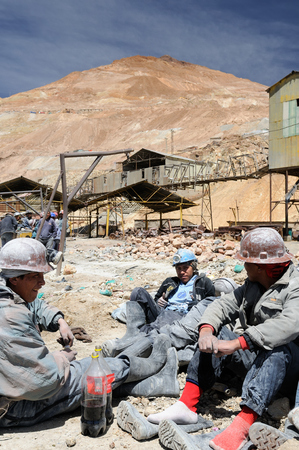 POTOSI, BOLIVIA - 17 SEPTEMBER 11: Miners during the work in an ancient gold mine and of silver to extract from Cerro Rico mountain being in the vicinity of the Potosi cityのeditorial素材