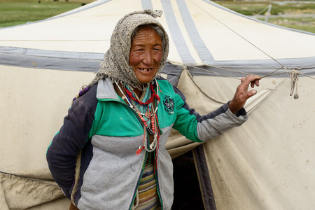 TIBET, CHANGTANG, LADAKH, INDIA - 06 JULY 2017:indian Changpas standing in front of the tent in which they live on the Changtang plateau in the area of the Tibetan plateauのeditorial素材