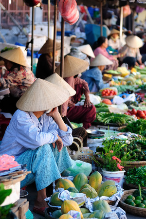 Seller on the colour market in Vietnamのeditorial素材