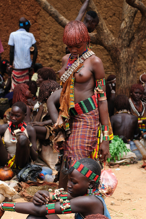 TURMI, OMO VALLEY, ETHIOPIA - 29 JULY 2013: Portrait of the young woman from Hamer people on the local marketplace in Turmi, Omo valley in July 29, 2013のeditorial素材