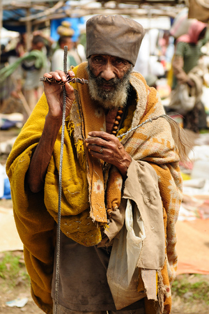LALIBELA, ETHIOPIA - 31 AUGUST 2013: Local Ethiopian pirglim being a market trader in the Lalibela town in Ethiopiaのeditorial素材