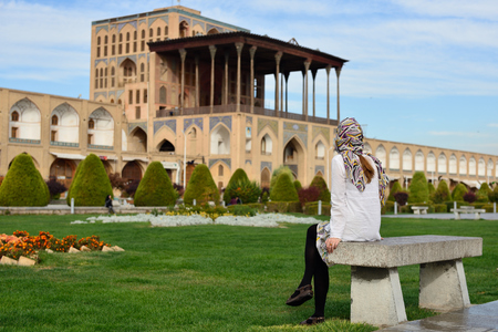 Iran, Ali Qapu Palace  is a grand palace in Isfahan on Naqsh-e Jahan Square in Isfahan (Esfahan). Tourist looking on the palaceのeditorial素材