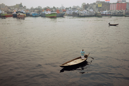DHAKA, BENGAL BANGLADESH - 28 JANUARY 2019: Busiest passenger traffic port in Dhaka. Boats for transport the peoples in Sadarghat on the Buriganga River.のeditorial素材