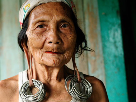 LONG BAGUN, BORNEO, INDONESIA - JULY 07: The older Dayak women with traditional long earlobes and tattoo from Borneoのeditorial素材