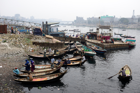 DHAKA, BENGAL BANGLADESH - 28 JANUARY 2019:  Busiest passenger traffic port in Dhaka. Boats for...