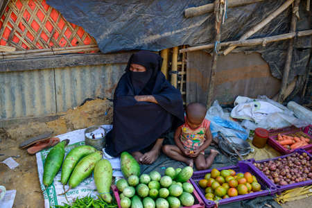 Kutupalong Refugee Camp, Coxs Bazar, Bangladesh - 08 February 2019: Living in one of the biggest refugee camps in the world. Refugees of the Rohinga minority, fleeing before massacres from neighbouring Burma live in the camp.のeditorial素材