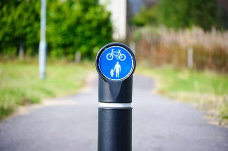 Walking and cycling friendly road sign in the countryの写真素材