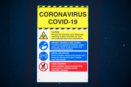 Construction building site Covid-19 health and safety signの写真素材