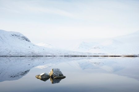 Rannoch Moor and Black Mount covered in snow during winter aerial viewの写真素材