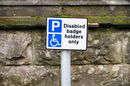 Disabled blue badge holder parking sign for driverの写真素材