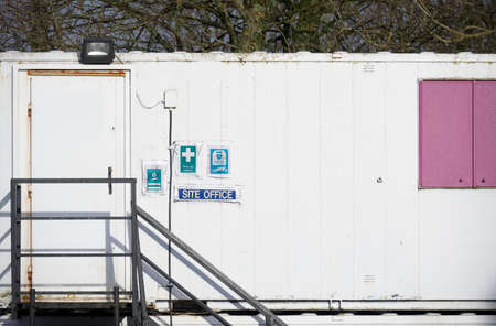 Construction site office in white metal containerの写真素材