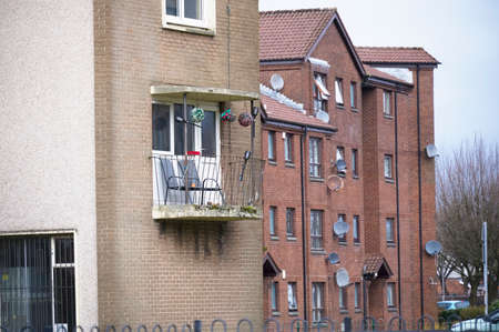 Derelict council house in poor housing estate slum with many social welfare issues in Port Glasgowの写真素材