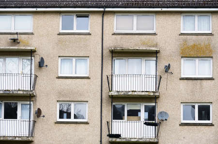 Derelict council house in poor housing estate slum with many social welfare issues in Port Glasgowの写真素材