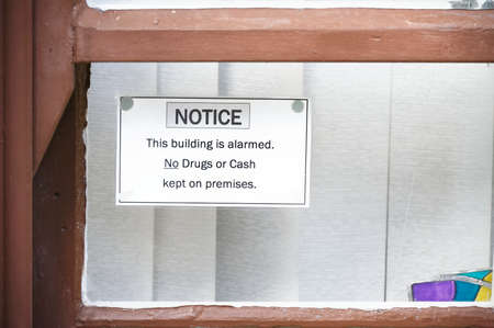 No drugs or cash left in building sign on window