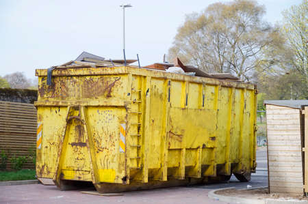 Rubbish and garbage in skip for disposal at dump siteの写真素材