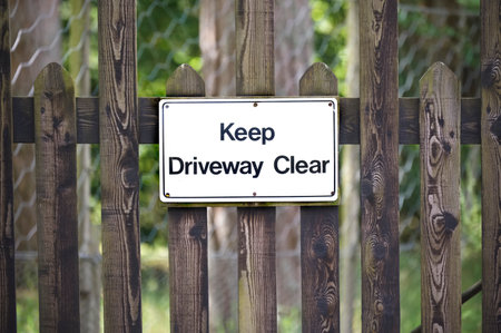 No parking private driveway sign outside house