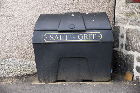 Salt grit black container for winter road safety on council roadの写真素材
