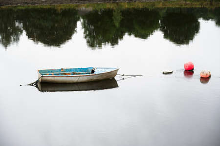 Boat in sea water for tranquility calm peace and mindfulnessの写真素材