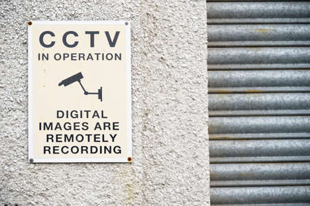 CCTV in operation 24 hours premises protected signの写真素材