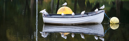 Boat in lake for tranquility calm peace and mindfulnessの写真素材