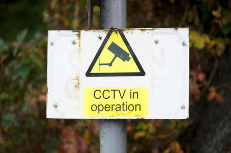CCTV in operation 24 hours premises protected signの写真素材